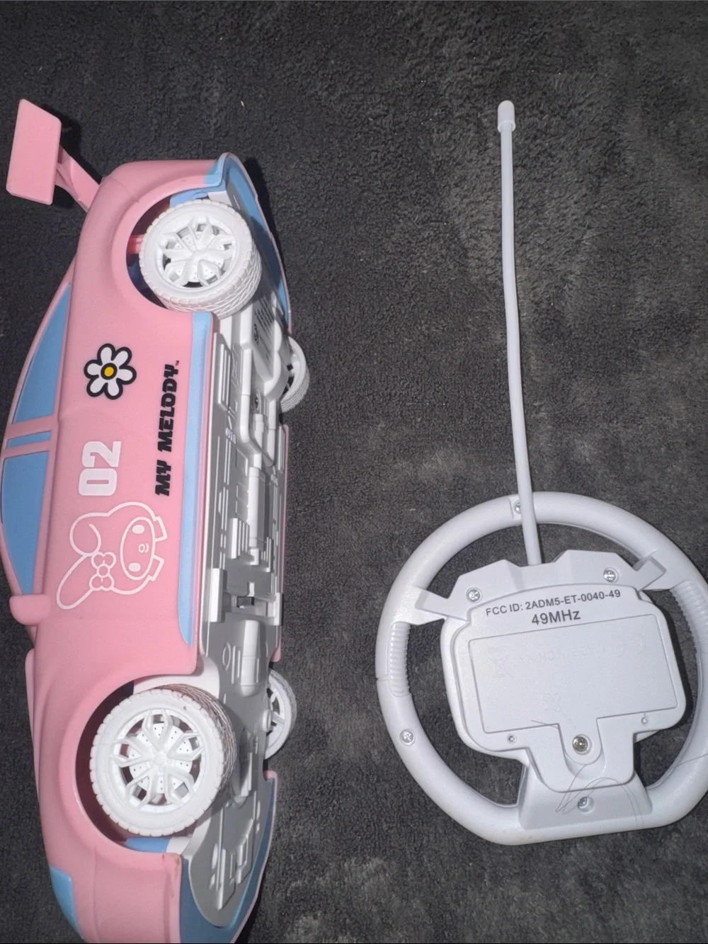 Used but works Sanrio My Melody Pink and Light Blue Remote Control Race Car